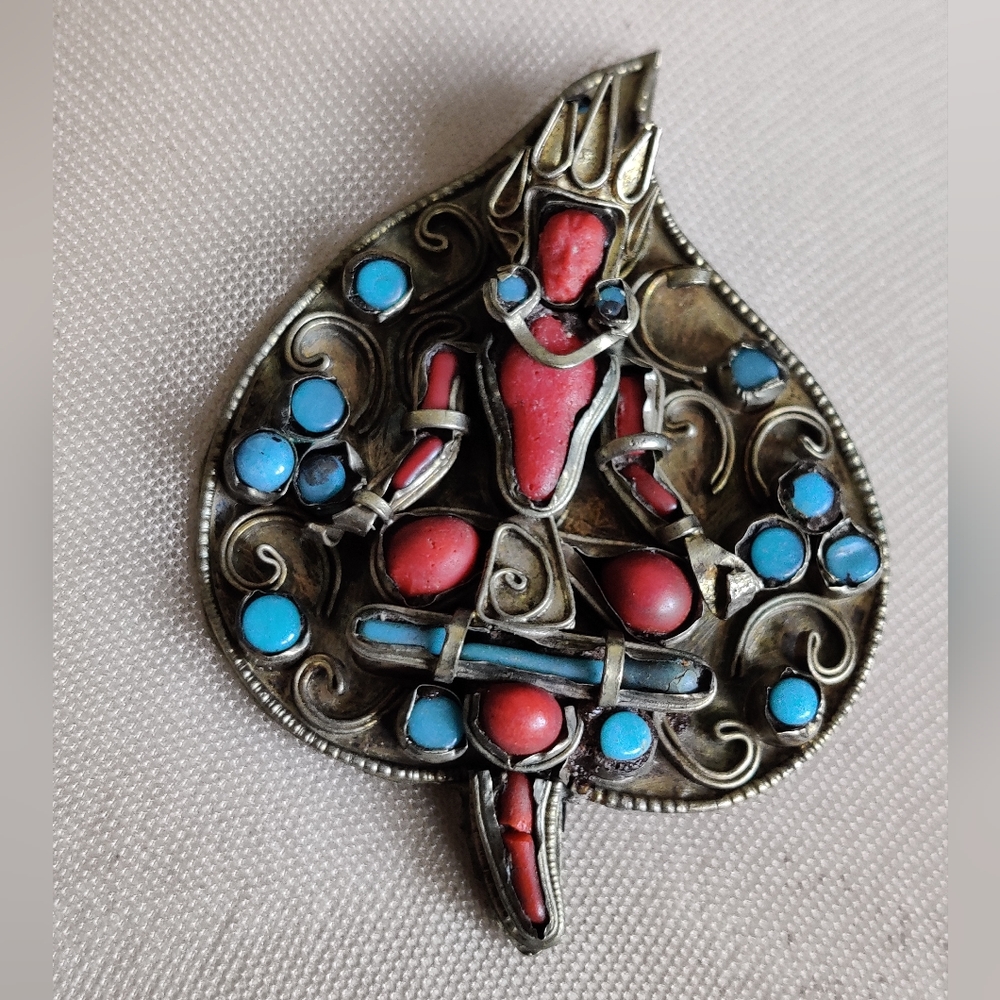 Antique Tibetan Pin Brooch with anthropomorphic deity figure corals turquoise